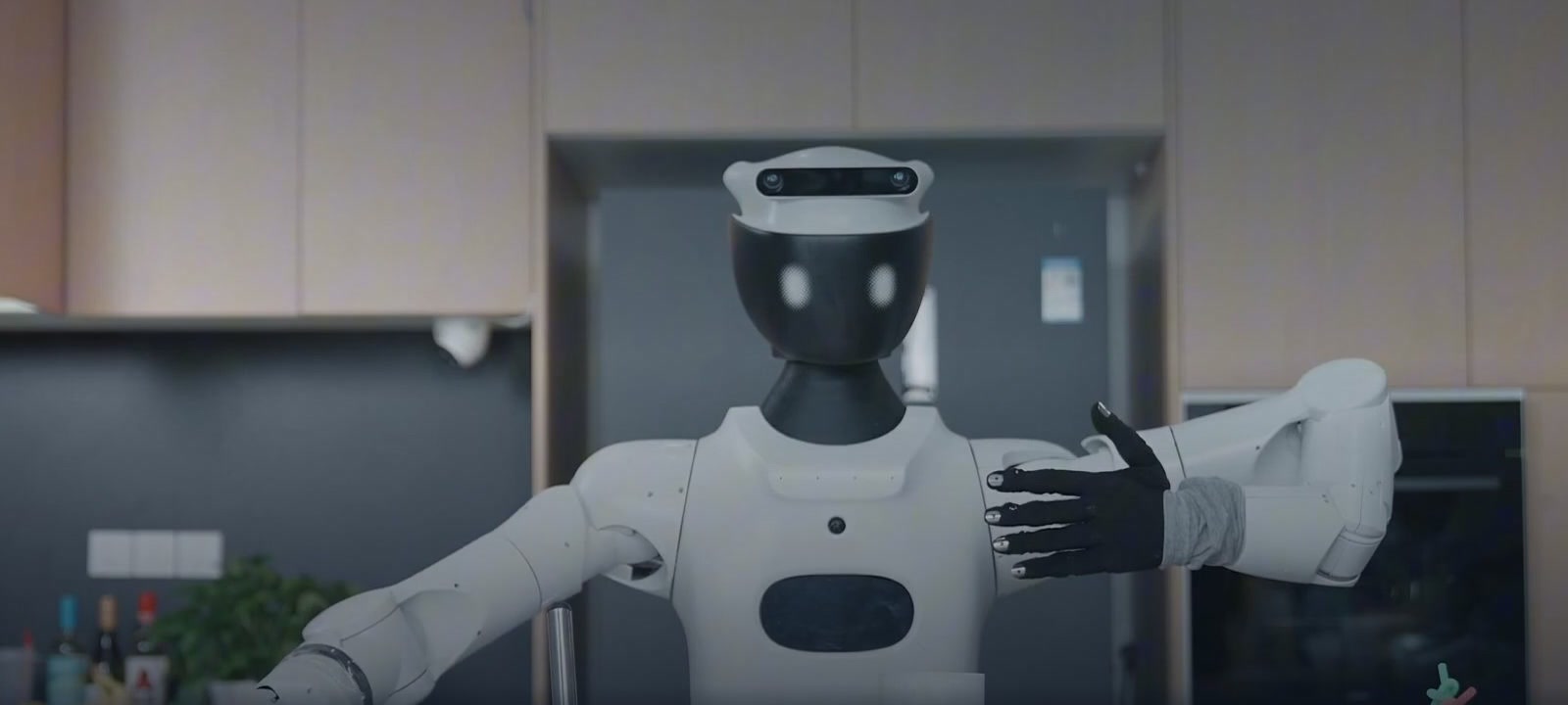 Astrabot demonstration robot coordinating its hands in a kitchen